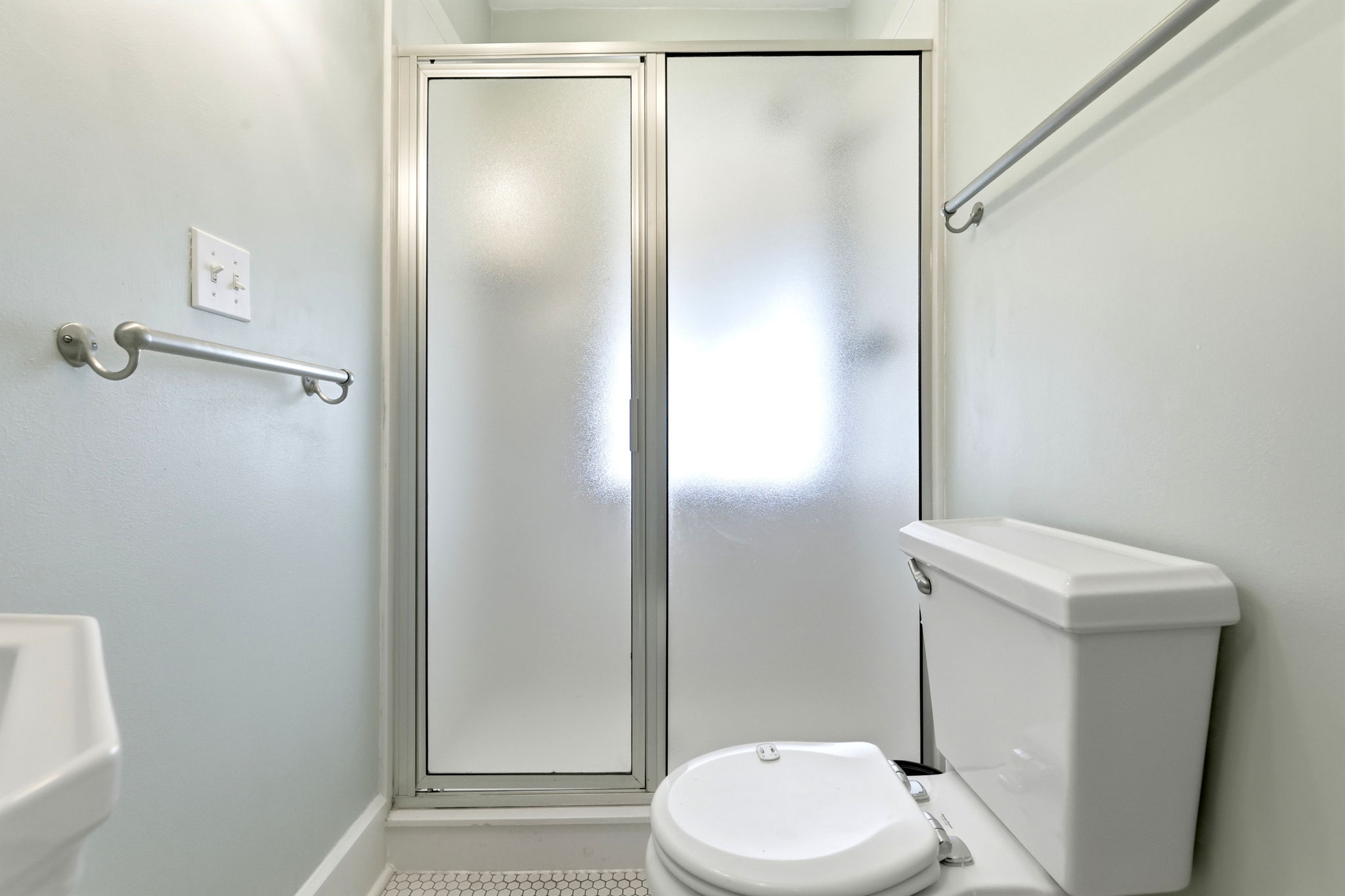 Main-level three-quarter bathroom, view 2