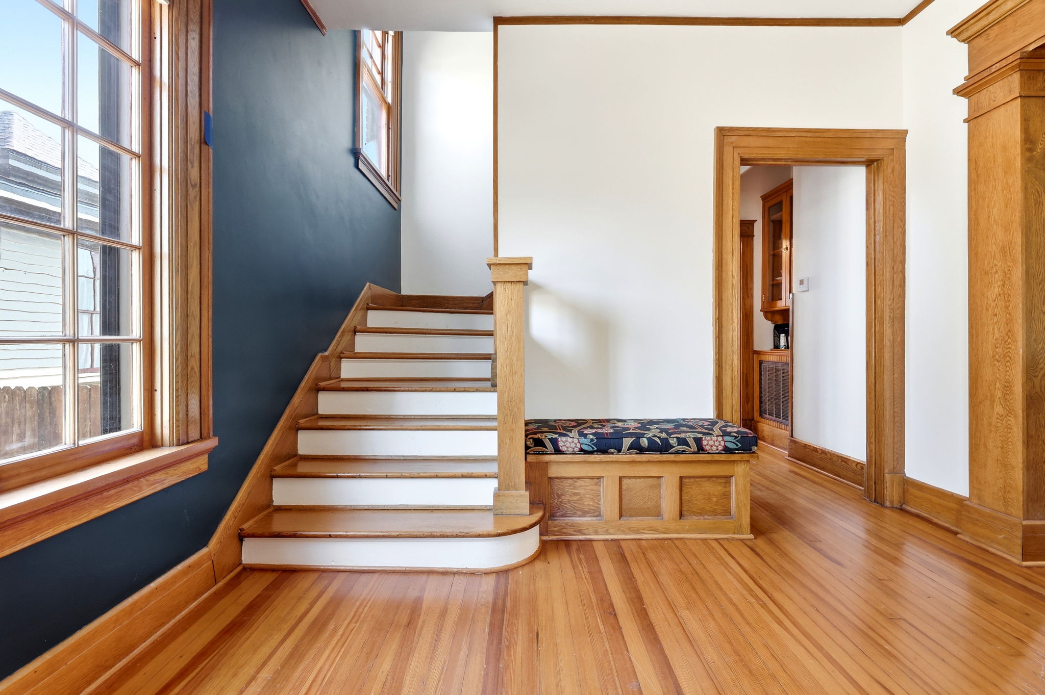 Main-level interior and original woodwork, view 4