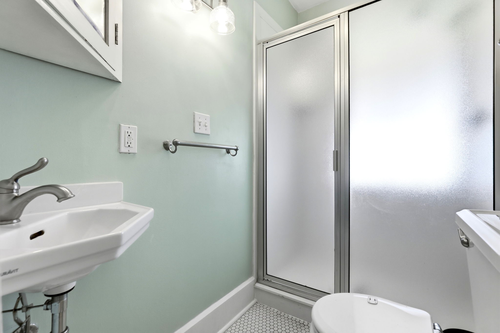 Main-level three-quarter bathroom, view 1